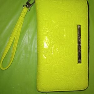 Betsy Johnson lime green skull wristlet. Like new